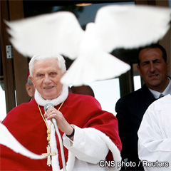 Pope Benedict XVI smiles as doves are released at the end of his visit to St. Corbinian Church in Rome. (CNS photo/Alessia Pierdomenico, Reuters)