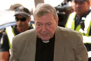 Australian Cardinal George Pell departs the Melbourne Magistrates&#039; Court March 5 in Melbourne. 