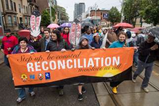 Native and non-native Canadians walked from Parliament and Dundas Streets to Queen’s Park to mark the close of the five-year inquiry of the Truth and Reconciliation Commission of Canada May 31.