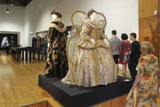 Visitors look at historic costumes worn by actors of several theater companies to represent some of the plays by British playwright William Shakespeare during July&#039;s Almagro&#039;s Classical Theatre Festival in Almagro, Spain. New historical research suggests that Shakespeare was a secret Catholic at a time when the faith faced persecution in England. 
