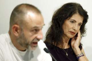 James Foley&#039;s mother, Diane Foley, right, sits next to El Periodico de Cataluna newspaper journalist Marc Marginedas during an Oct. 14 meeting of the Catalonian Journalist Association in Barcelona. The parents of slain U.S. journalist James Foley have re ceived an award on their son&#039;s behalf from the U.S. Institute of Peace.