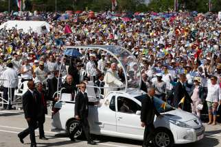 Pope Francis arrives to celebrate Mass in Revolution Square in Holguin, Cuba, Sept. 21.