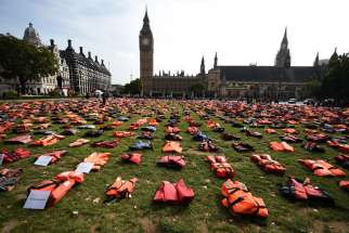 Life jackets worn by fleeing refugees lie in Parliament Square in London, U.K. Sept. 19. The number of migrants and refugees who have died at sea is expected to reach an all-time high in 2016, according to the U.N. Refugee Agency.