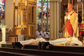Cardinal Thomas Collins presides at 2018 ordination Mass at St. Michael’s Cathedral in Toronto. 