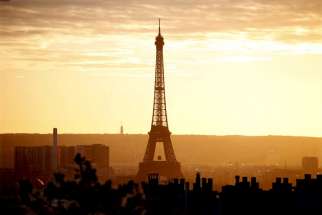 The Eiffel Tower is seen at sunset in Paris Nov. 22. Catholic organizations said the terror attacks in Paris had not dissuaded them from attending the UN climate change conference Nov. 30-Dec. 11.