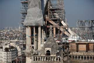 Scaffolding surrounds the damaged Notre Dame Cathedral in Paris April 15.