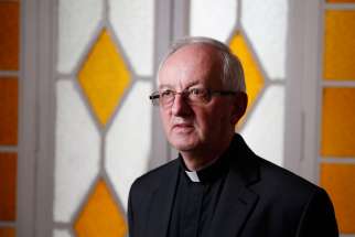 Father John Fogarty, superior general of the Congregation of the Holy Spirit, is pictured at the order&#039;s headquarters in Rome April 20. Father Fogarty said drawing up guidelines for the congregation to prevent sexual abuse &quot;was the first priority&quot; after he became superior in 2012.