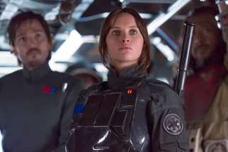 Diego Luna, Felicity Jones and Jiang Wen star in a scene from the movie &quot;Rogue One: A Star Wars Story.&quot;