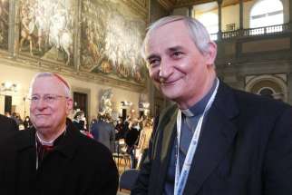 Italian Cardinals Gualtiero Bassetti of Perugia-Città della Pieve and Matteo Zuppi of Bologna attend the concluding session of the &quot;Mediterranean for Peace&quot; meeting at Palazzo Vecchio in Florence, Italy, in this Feb. 27, 2022, file photo. Cardinal Zuppi has been chosen by Pope Francis as the president of the Italian bishops&#039; conference, succeeding Cardinal Bassetti.