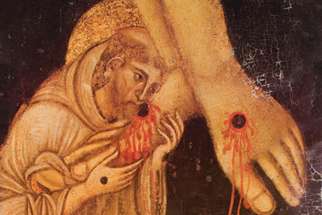 St. Francis kissing the feet of Christ, from a painting of a crucifix in Arezzo, Italy.