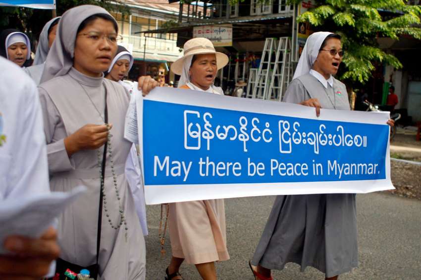 Nuns carry a banner reading &quot;May there be peace in Myanmar&quot; during an Oct. 22 protest in Myitkyina in opposition to the country&#039;s civil war. Retired Archbishop Paul Zinghtung Grawng of Mandalay said the Kachin people are &quot;very fearful&quot; and have &quot;little hope of peace&quot; any time soon.