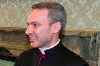 A Vatican court indicted Msgr. Carlo Alberto Capella, a former staff member at the Vatican nunciature in Washington, and ordered him to stand trial beginning June 22 on charges of possessing and distributing child pornography. He is pictured in a 2015 photo at the Vatican. 