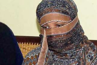  Asia Bibi, a Pakistani Catholic accused of blasphemy, is pictured in a 2010 file photo. The Supreme Court in Pakistan upheld its acquittal of Bibi Jan. 29. 