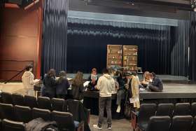 HCDSB newcomer students rehearsing at St. Thomas Aquinas Catholic Secondary School Auditorium for their production Break Through the Darkness and Christmas Madness.