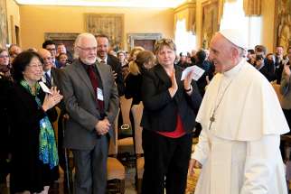 Pope Francis leads an audience with members of the International Federation of Catholic Universities at the Vatican Nov. 4. The pope encouraged Catholic universities to study the root causes of migration.