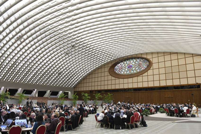 Participants in the assembly of the Synod of Bishops gather for an afternoon session Oct. 25, 2023, in the Paul VI Audience Hall at the Vatican.