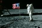 Astronaut Edwin “Buzz” Aldrin poses beside U.S. flag during the Apollo 11 mission on the moon July 20, 1969.
