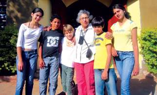 Rosa Frias, third from right, poses with young people, in Limpio, Paraguay, where her charity Children of Paraguay recently opened a children’s medical clinic. The Ottawa woman was inspired to continue her work after an audience with Pope Francis.
