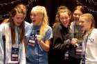 Members of a youth group from the Diocese of Des Moines, Iowa, perform karaoke at the Thematic Village of the National Catholic Youth Conference in Indianapolis.