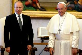 Pope Francis is pictured with Russian President Vladimir Putin during a private audience at the Vatican July 4, 2019. 