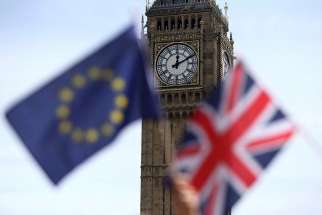  A European Union flag and British Union flag are seen at Parliament Square in London June 19. Voters in the United Kingdom voted June 23 to leave the European Union.