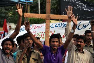 Pakistani members of the Christian minority shout slogans during a Nov. 9 protest in Karachi, Pakistan, against the killing of a Christian couple accused of blasphemy in November 2014. 