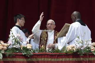  Pope Francis delivers his Easter message and blessing &quot;urbi et orbi&quot; (to the city and the world) from the central balcony of St. Peter&#039;s Basilica at the Vatican April 16.
