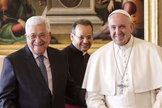 Pope Francis is pictured with Palestinian President Mahmoud Abbas during a meeting at the Vatican Jan. 14.