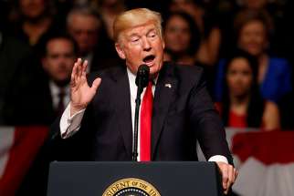 U.S. President Donald Trump announces his Cuba policy July 16 at the Manuel Artime Theater in Little Havana, a neighborhood of Miami.
