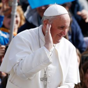Pope Francis gestures as he arrives to lead his general audience in St. Peter's Square at the Vatican April 3.