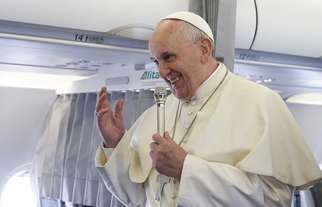 Pope Francis speaks to media on his flight to speak at European Parliament in France