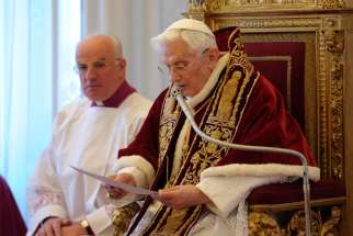 Pope Benedict XVI reads his resignation in Latin during a meeting of cardinals at the Vatican in this Feb. 11, 2013, file photo. In a Feb. 5, 2018, letter to a journalist from an Italian newspaper, the retired pope said he has diminished physical strength and inwardly is on a &quot;pilgrimage to Home.&quot;