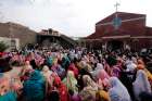 Pakistani Christians gather at a church March 16 to protest two suicide attacks on churches in Lahore. The latest round of attack happened June 4 when two gunmen open fired at St. Joseph Church