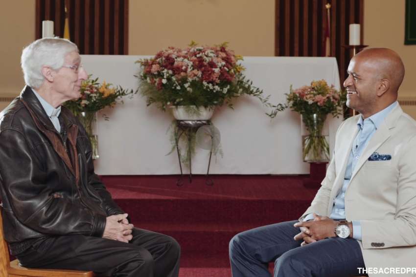 Deacon Robert Kinghorn, above left, speaks with Jonathan Michael in Episode 4 of The Sacred Project. This episode discusses Kinghorn’s “Church on The Street” ministry.