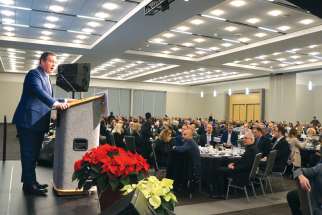 Alberta Premier Jason Kenney speaks at the revived provincial Christian prayer breakfast.