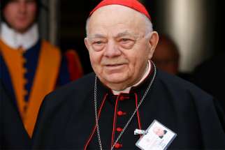 Cardinal Elio Sgreccia, former head of the Pontifical Academy for Life, died June 5 at the age of 90. In his role at the academy Cardinal Sgreccia helped articulate the Vatican&#039;s position on life issues. He is pictured leaving a session of the extraordinary Synod of Bishops on the family at the Vatican in this Oct. 16, 2014, file photo. 