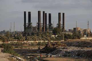 The power plant that generates electricity in the central Gaza Strip is seen June 14. Electrical service is sporadic because of political maneuvering among Palestian groups and the Israeli government, forcing residents to be resourceful in coping in their daily life.