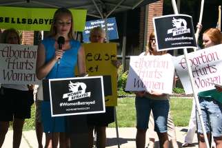 Jesse Craig, vice president of Right to Life at the University of Utah, speaks at the Women Betrayed event in Salt Lake City July 28. Demonstrations were held in 65 cities across the country calling for an end to federal funding of Planned Parenthood.