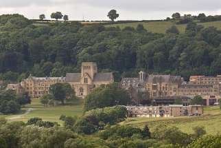 View across the valley of the monastery and college buildings of Ampleforth, a Benedictine abbey and college in north Yorkshire, England. 