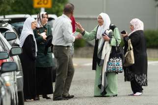Members of a family react outside the Al Noor Mosque in Christchurch, New Zealand, March 15, 2019. Forty-nine people were assassinated and at least 40 more are being treated for gunshot wounds following the mosque terror attacks. 