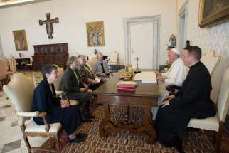 Pope Francis meets with representatives of the U.S. Leadership Conference of Women Religious in his library in the Apostolic Palace at the Vatican April 16. The same day the Vatican announced the conclusion of a seven-year process of investigation and di alogue with the group to ensure fidelity to church teachings. The outcome resulted in revised statues approved by the Vatican.