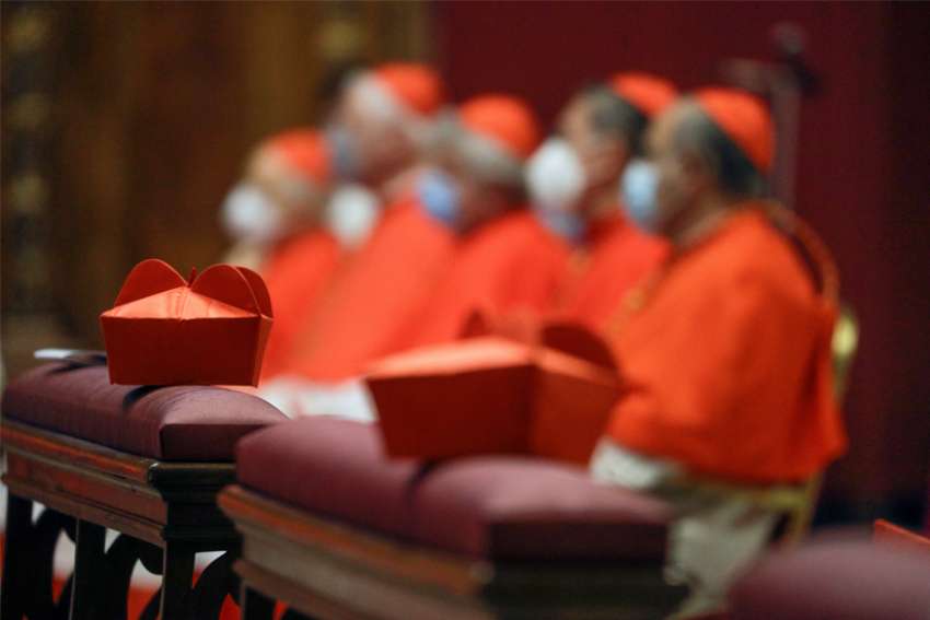 Red birettas are pictured during Pope Francis&#039; Mass with new cardinals in St. Peter&#039;s Basilica at the Vatican Nov. 29, 2020.