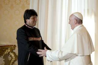 Pope Francis welcomes Bolivia&#039;s President Evo Morales during a meeting at the Vatican April 15.
