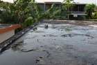Standing water is seen on a flat roof in San German, Puerto Rico, in this undated photo. Puddles of water contribute to the spread of Zika in Puerto Rico.