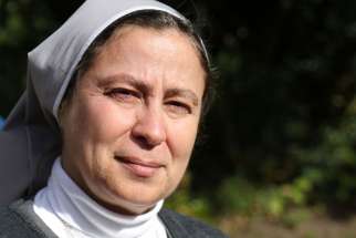 Sister Annie Demerjian, a member of the Sisters of Jesus and Mary who is working with Christian families in Aleppo, Syria, poses for a photo Oct. 10 in Lancaster, England.