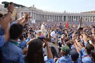 A large crowd greets Pope Francis as he arrives for an audience in mid-June in St. Peter&#039;s Square at the Vatican. More than 3.2 million pilgrims visited and attended papal events, liturgies or prayer services at the Vatican in 2015, the Vatican said.