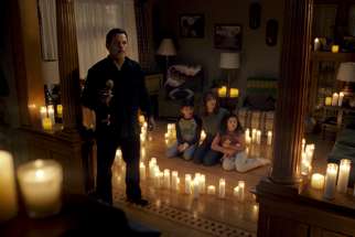 From left, Raymond Cruz, Roman Christou, Linda Cardellini and Jaynee-Lynne Kinchen star in a scene from the movie &quot;The Curse of La Llorona.&quot;