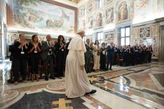 Pope Francis arrives for a meeting with doctors, patients and members of the Italian Association of Medical Oncology at the Vatican Sept. 2, 2019.