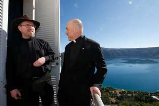 Jesuit Brother Bob Macke and Jesuit Father Gabriele Gionti, an astronomer, prepare to give journalists a tour of the Vatican Observatory at the papal villa at Castel Gandolfo, Italy, Sept. 28, 2018. Brother Macke said that by studying the universe, &quot;we can better appreciate the God who created it.&quot;