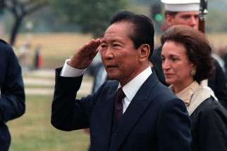 former president of the Philippines, Ferdinand Marcos, the dictator ousted in the 1986 People Power revolution, was secretly given military honors before burial at the Heroes&#039; Cemetery.